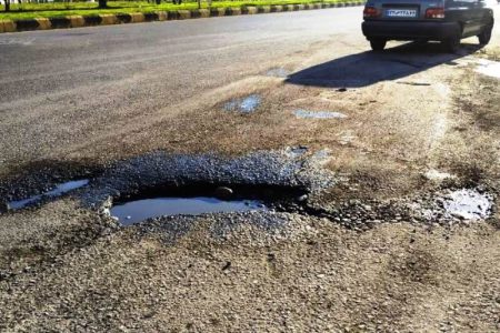 منطقه یک تهران با آسفالت‌های فرسوده